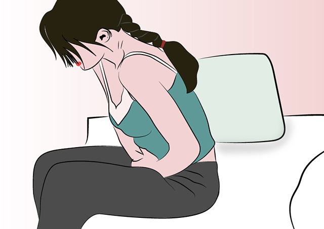 胃痛坐在床上的女孩-01w适用.jpg